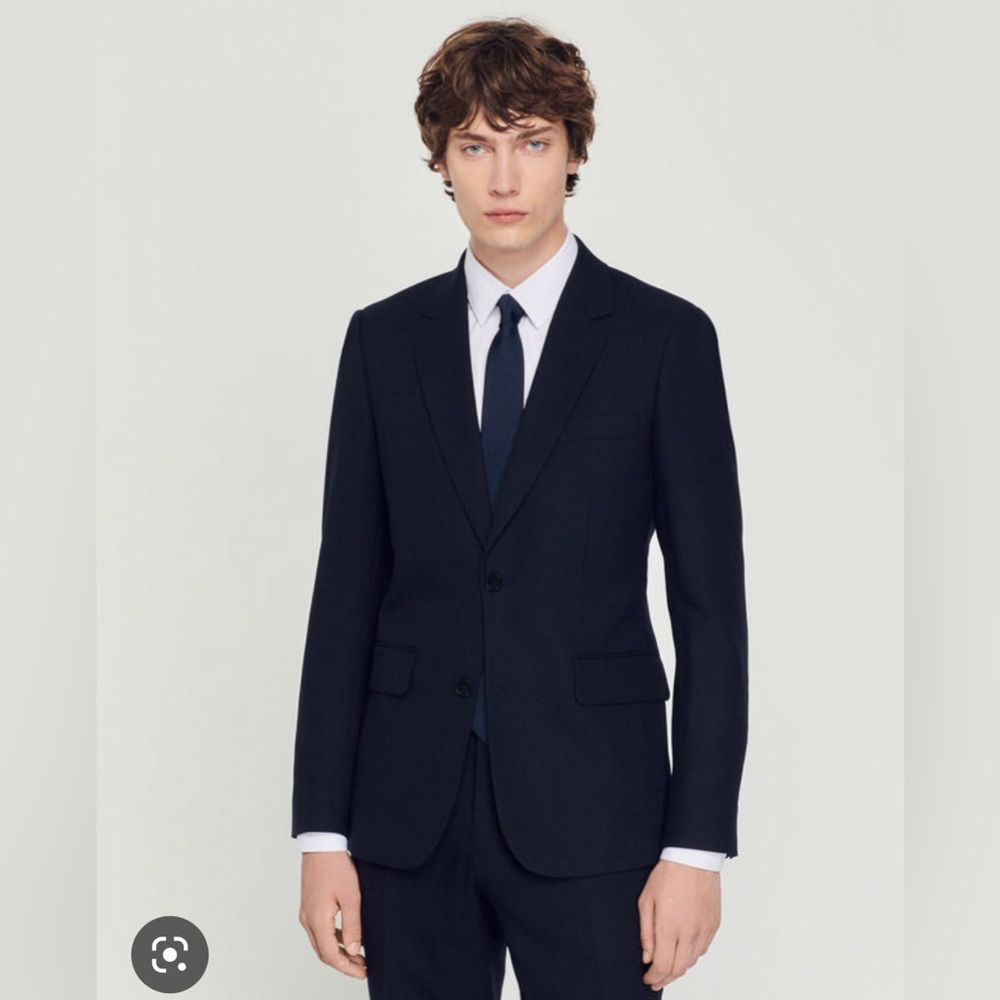 New Sandro Suit jacket. Receipt Attached , never worn. Size 48, fits M/L